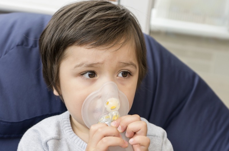 A spacer can be used to help administer asthma medication to a young child