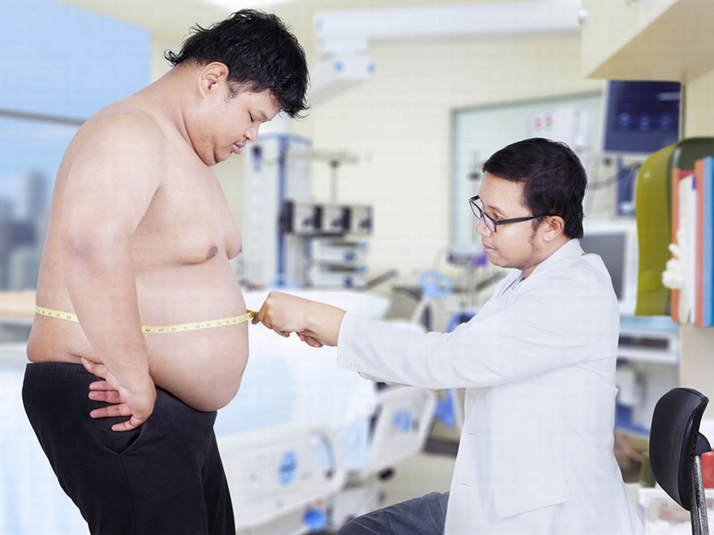 Obesity, growing problem, doctor and patient