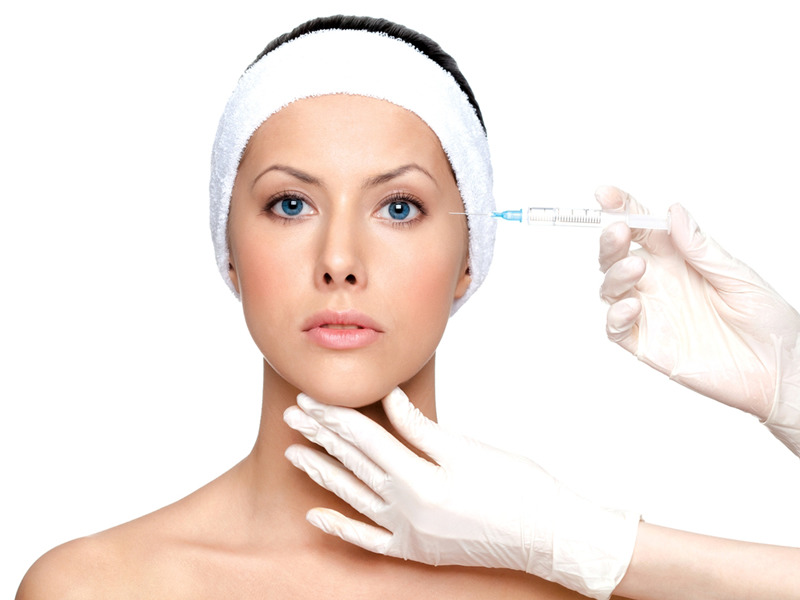 Woman getting a botox injection for article on anti-ageing treatments - botox, fillers, liposuction