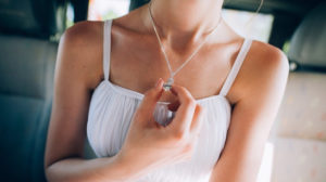 image of woman in necklace for feature on Hong Kong jewellers