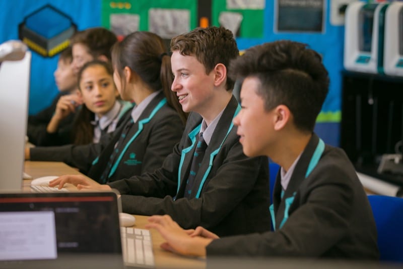 image of Nord Anglia students using computers for cyber safety story