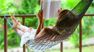 Good books to read: girl reading in hammock