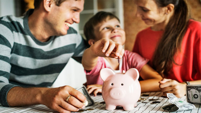 Family with money for web article on how to teach kids about money