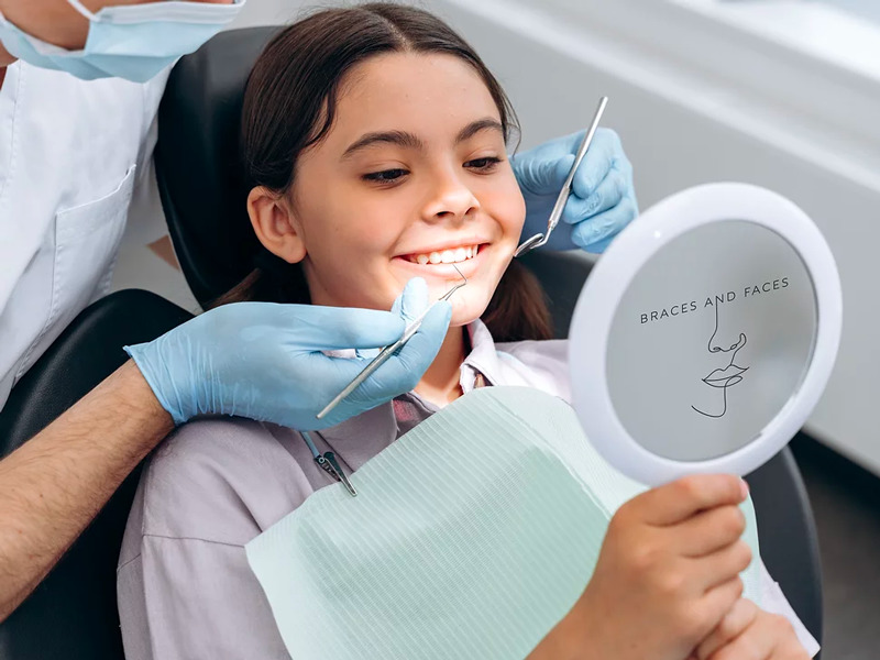 Child having dental treatment at Braces and Faces
