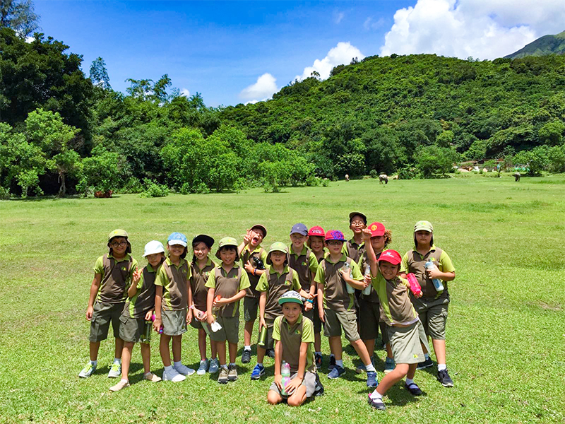 Lantau International School - students in green uniforms
