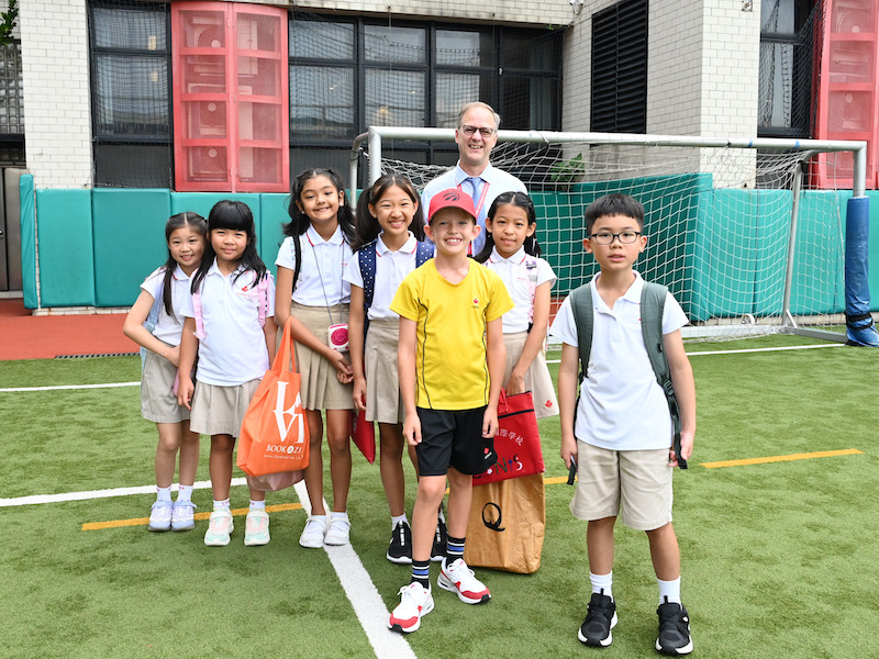 CDNIS HK headmaster english teacher with students